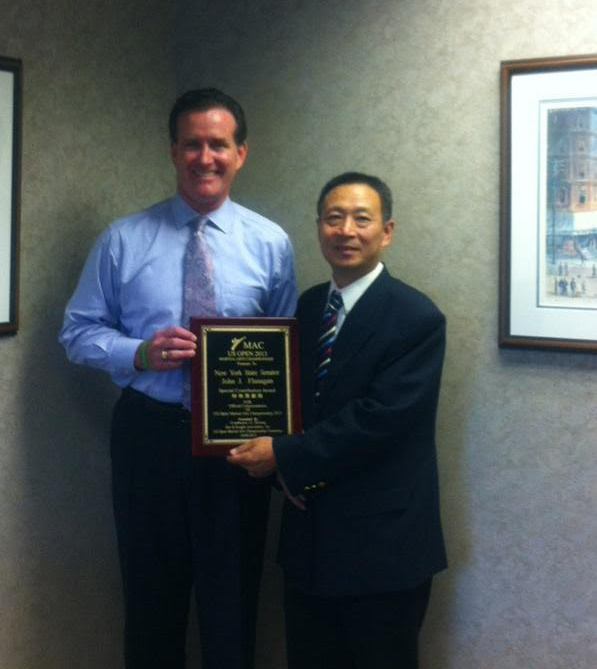 President Ted Gulong of the World Fighting Martial Arts Championship meeting with NY State Senator John J. Flanagan.