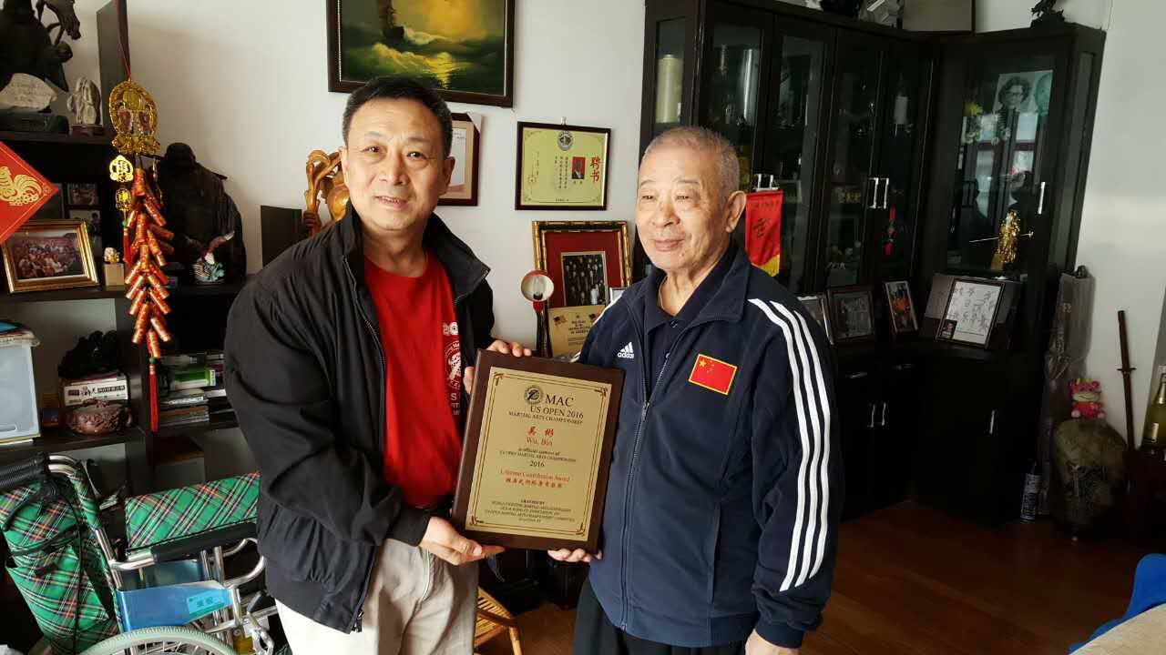 President of the WFMAF presented special contribution award to Grandmaster Wu Bin
